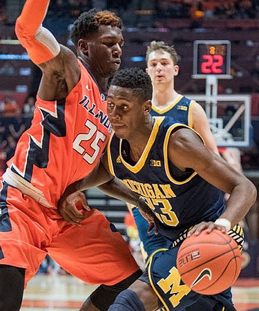 Caris LeVert (23) and Mark Donnal (34)