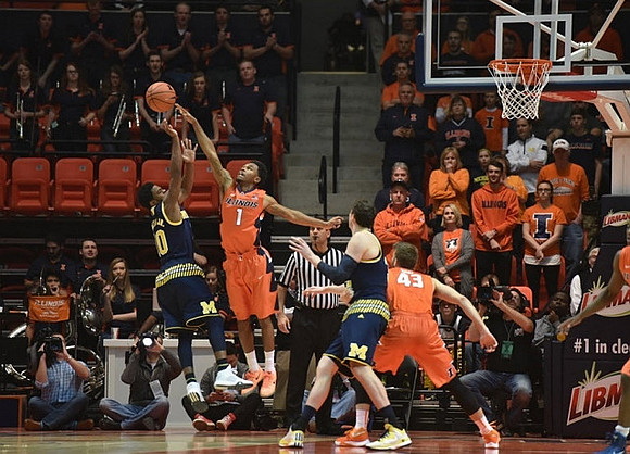Derrick Walton Jr. (10) and Ricky Doyle (32)