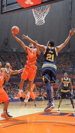 Zak Irvin (21) and Caris LeVert (23)