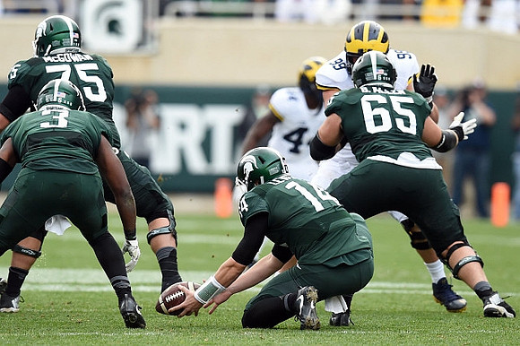 Delano Hill (44) and Matthew Godin (99)