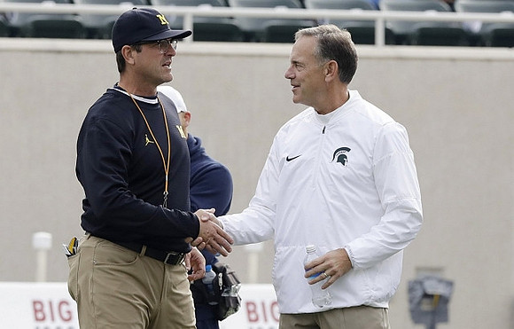 Jim Harbaugh and Michigan State Head Coach Mark Dantonio