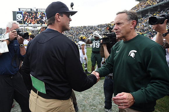 Jim Harbaugh and Michigan State Head Coach Mark Dantonio