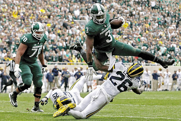 Dymonte Thomas (25) and Jourdan Lewis (26)