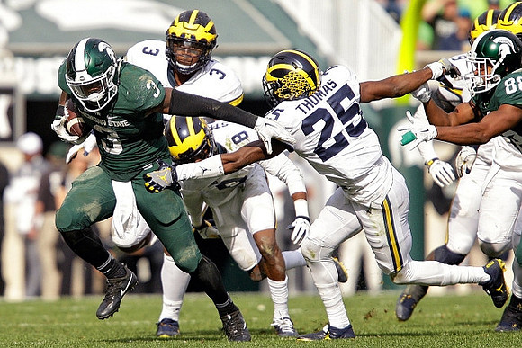 Rashan Gary (3), Channing Stribling (8), and Dymonte Thomas (25)