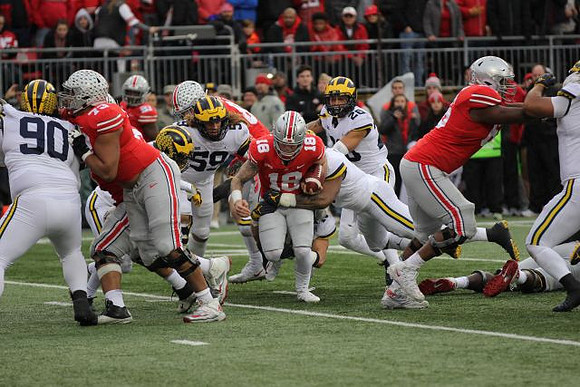 Bryan Mone (90) and Noah Furbush (59)