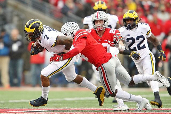 Tarik Black (7) and Karan Higdon (22)