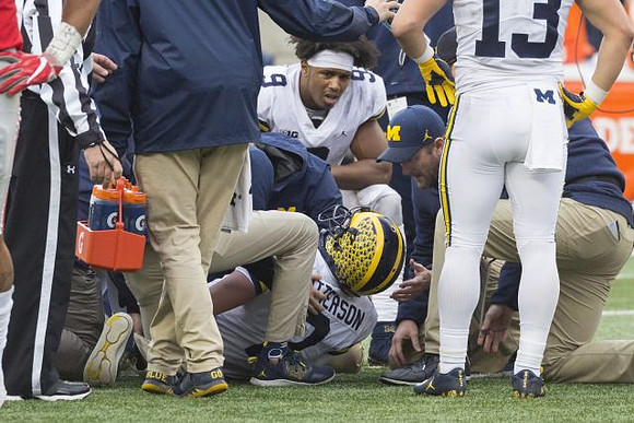 Shea Patterson (2), Donovan Peoples-Jones (9), and Tru Wilson (13)