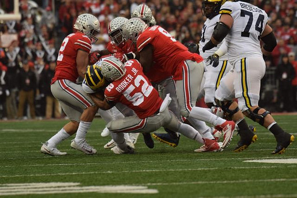 Tru Wilson (13), Cesar Ruiz (51), and Ben Bredeson (74)