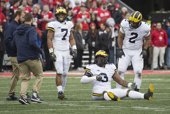 Khaleke Hudson (7), Rashan Gary (3), and Carlo Kemp (2)