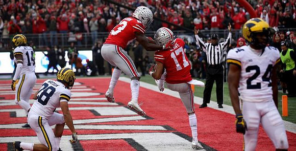 Josh Metellus (14), Brandon Watson (28), and Lavert Hill (24)