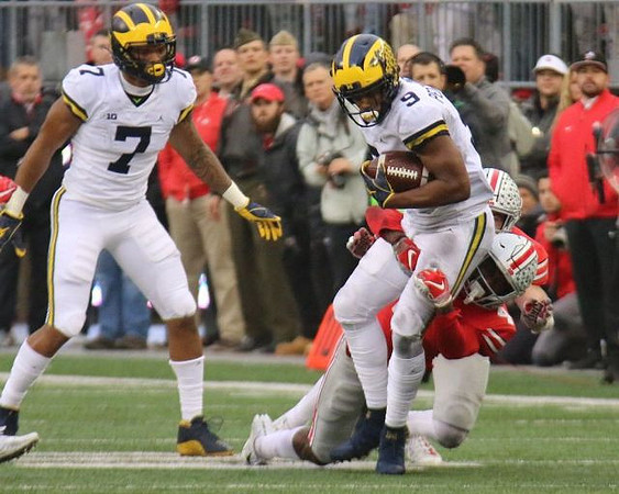Tarik Black (7) and Donovan Peoples-Jones (9)