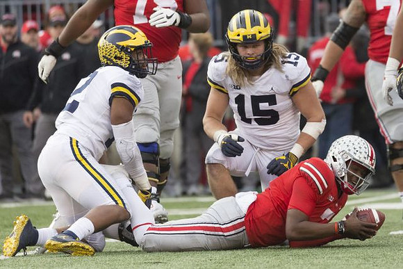 Carlo Kemp (2) and Chase Winovich (15)