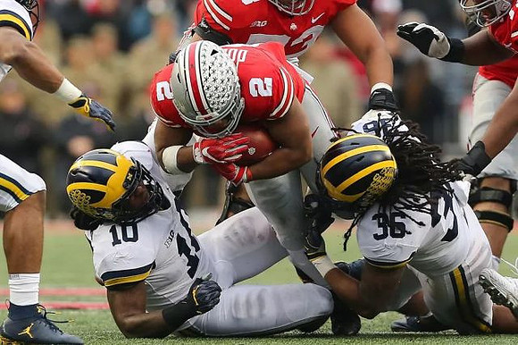 Devin Bush (10) and Devin Gil (36)