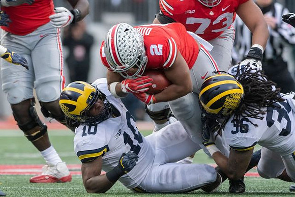Devin Bush (10) and Devin Gil (36)