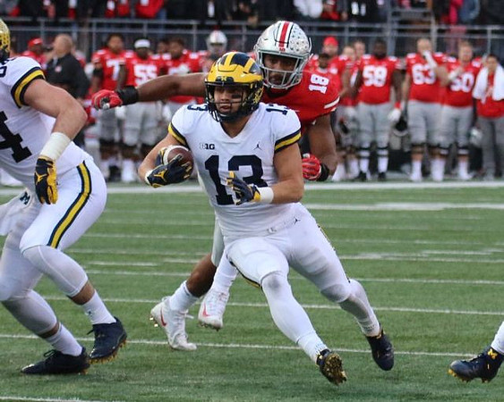 Sean McKeon (84) and Tru Wilson (13)
