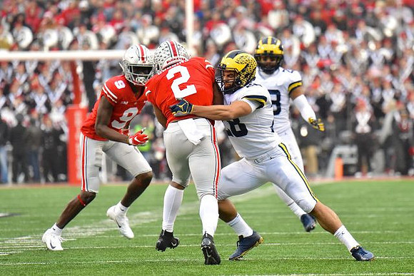 Brandon Watson (28) and Tyree Kinnel (23)