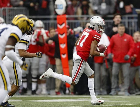 Josh Metellus (14) and Brandon Watson (28)
