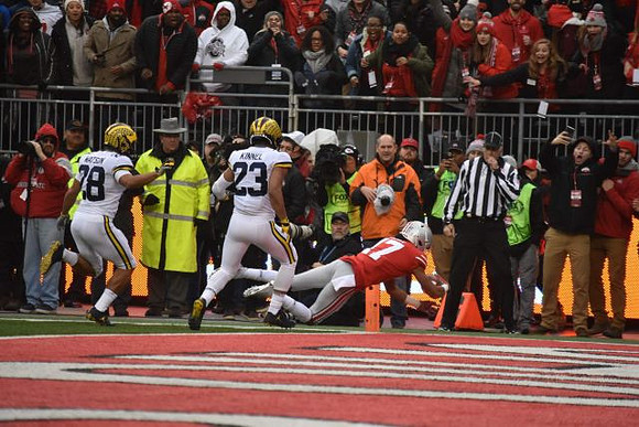 Brandon Watson (28) and Tyree Kinnel (23)