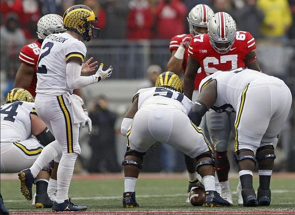 Ben Bredeson (74), Shea Patterson (2), Cesar Ruiz (51), and Michael Onwenu (50)