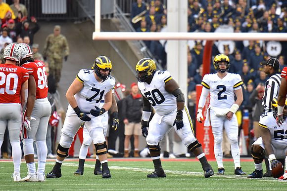Andrew Stueber (71), Michael Onwenu (50), and Shea Patterson (2)