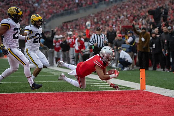 Tyree Kinnel (23) and Brandon Watson (28)