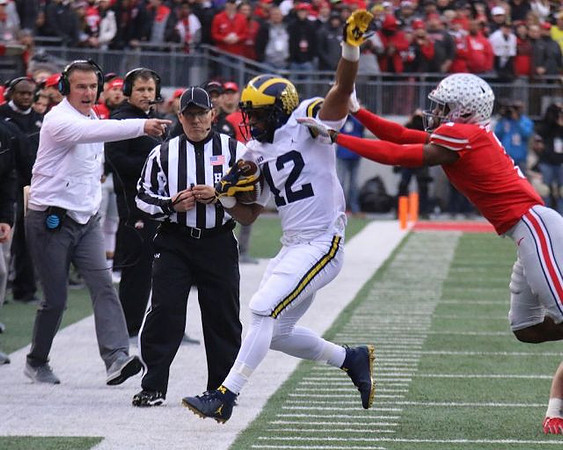 Chris Evans (12) and Ohio State Head Coach Urban Meyer