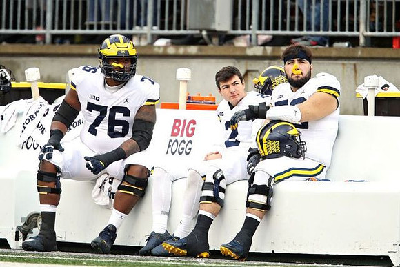 Juwann Bushell-Beatty (76) and Jake Moody (2)