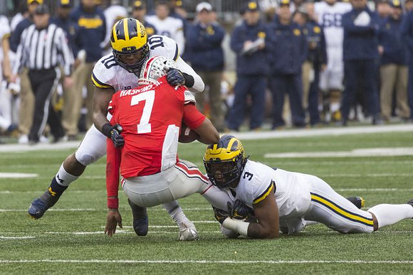 Devin Bush (10) and Rashan Gary (3)