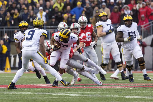 Chris Evans (12), Donovan Peoples-Jones (9), Tarik Black (7), Andrew Stueber (71), and Cesar Ruiz (51)