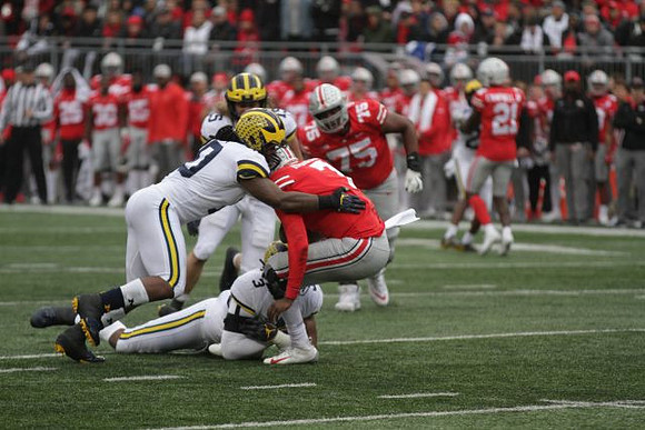 Rashan Gary (3), Devin Bush (10), and Chase Winovich (15)