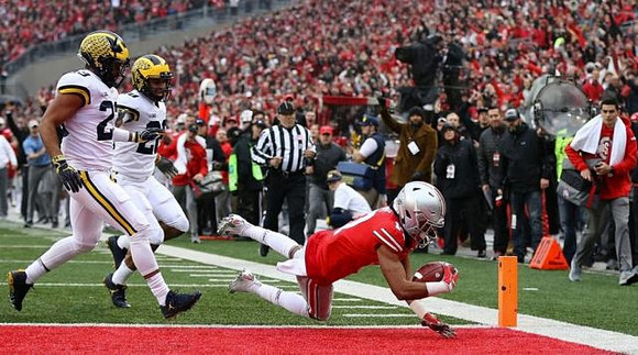 Tyree Kinnel (23) and Brandon Watson (28)