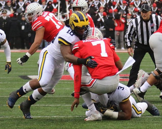 Devin Bush (10) and Rashan Gary (3)
