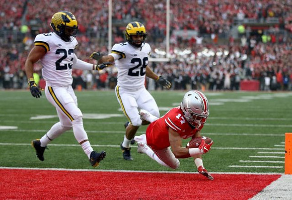 Tyree Kinnel (23) and Brandon Watson (28)