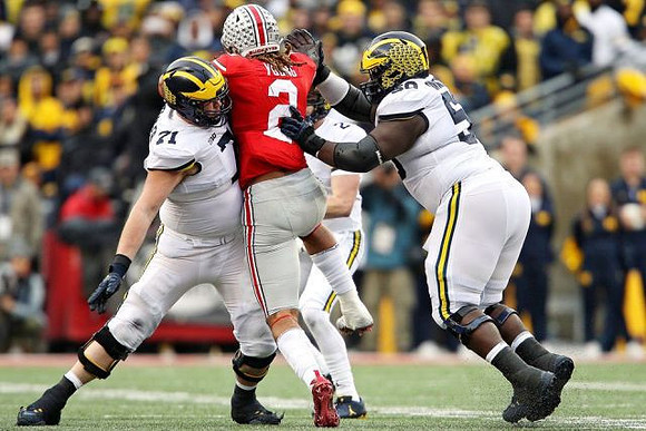 Andrew Stueber (71), Shea Patterson (2), and Michael Onwenu (50)