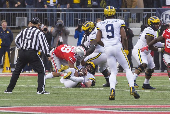 Shea Patterson (2), Michael Onwenu (50), Donovan Peoples-Jones (9), and Cesar Ruiz (51)