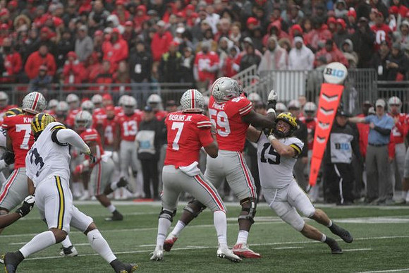 Rashan Gary (3) and Chase Winovich (15)