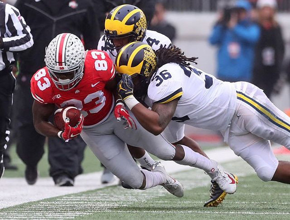 Lavert Hill (24) and Devin Gil (36)