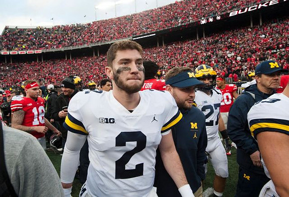 Shea Patterson (2) and Joe Hewlett (27)