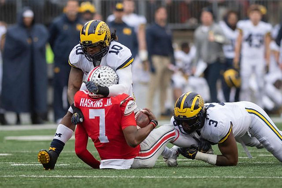Devin Bush (10) and Rashan Gary (3)