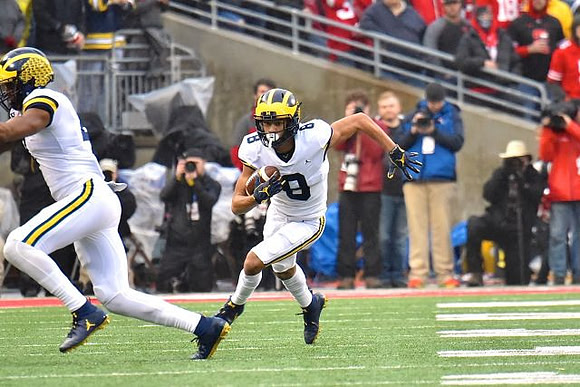 Nico Collins (4) and Ronnie Bell (8)