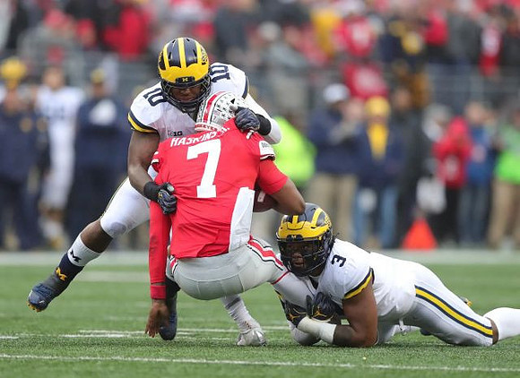 Devin Bush (10) and Rashan Gary (3)