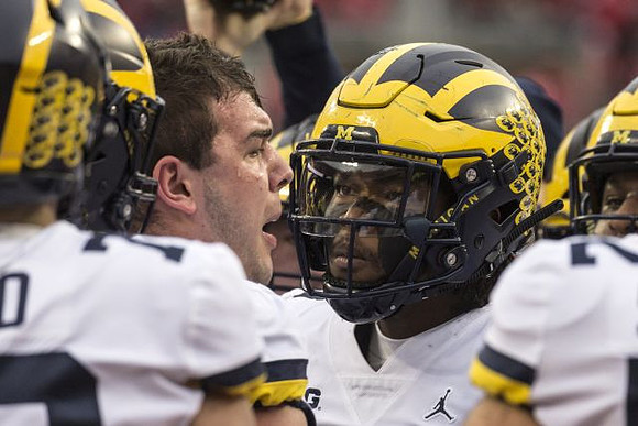 Ben Bredeson (74) and Rashan Gary (3)