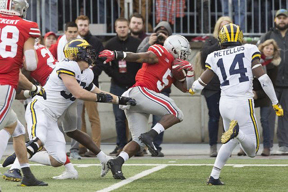 Noah Furbush (59) and Josh Metellus (14)