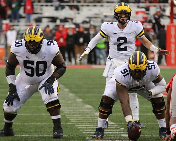 Michael Onwenu (50), Shea Patterson (2), and Cesar Ruiz (51)