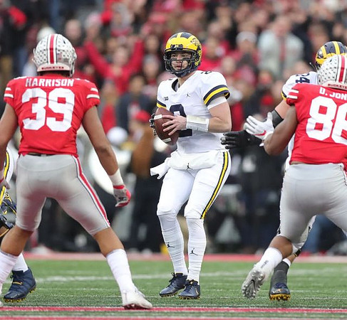 Shea Patterson (2) and Ben Bredeson (74)