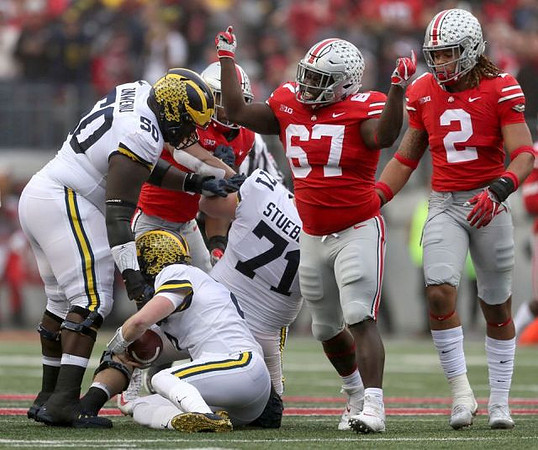 Michael Onwenu (50), Shea Patterson (2), and Andrew Stueber (71)