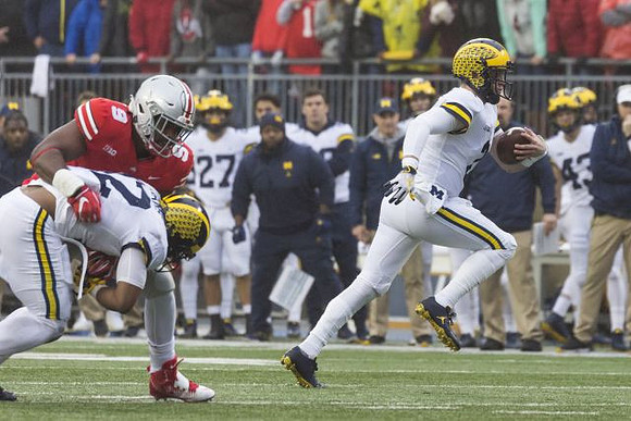 Ben Mason (42) and Shea Patterson (2)