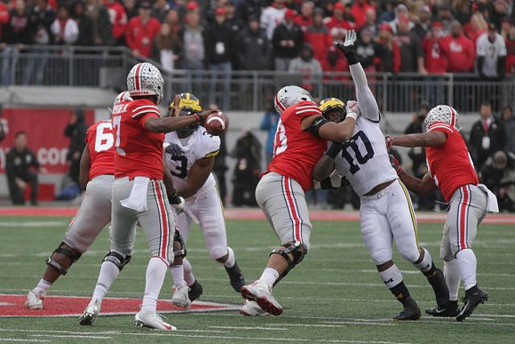 Rashan Gary (3) and Devin Bush (10)