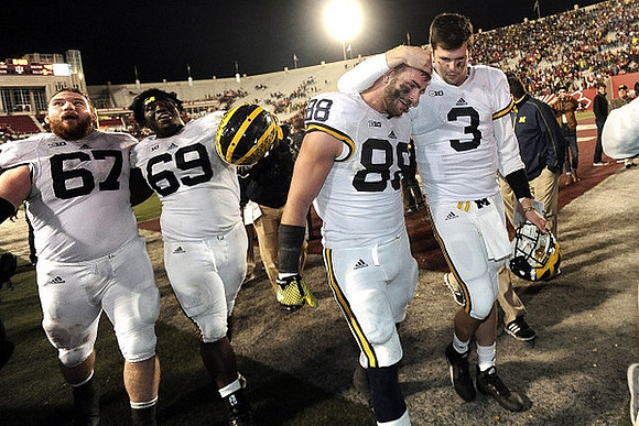 Kyle Kalis (67), Willie Henry (69), Jake Butt (88), and Wilton Speight (3)