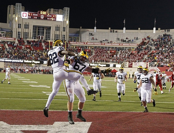 Amara Darboh (82), Kyle Kalis (67), Jake Rudock (15), Erik Magnuson (78), Graham Glasgow (61), Ben Braden (71), and Mason Cole (52)